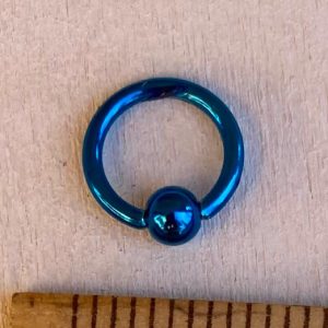 piercing anello blu