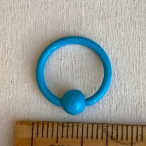 piercing nipplle azzurro