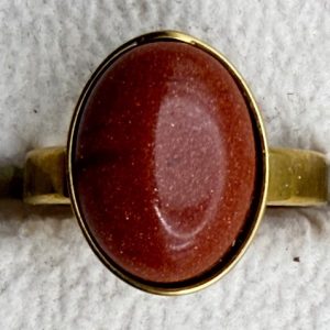 anello acciaio dorato pietra